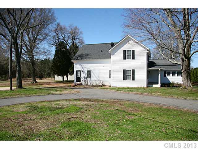 6441 Stirewalt Road Kannapolis, NC 28081 - Photo 3 of 16 a view of a house with a yard