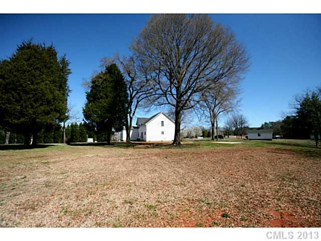 6441 Stirewalt Road Kannapolis, NC 28081 - Photo 4 of 16 a big yard with large trees