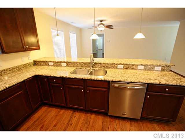6441 Stirewalt Road Kannapolis, NC 28081 - Photo 6 of 16 a bathroom with a sink and a mirror