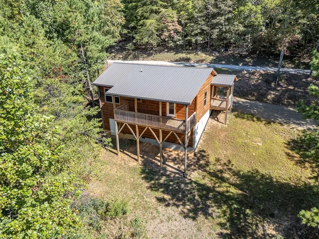a view of a field with an ocean