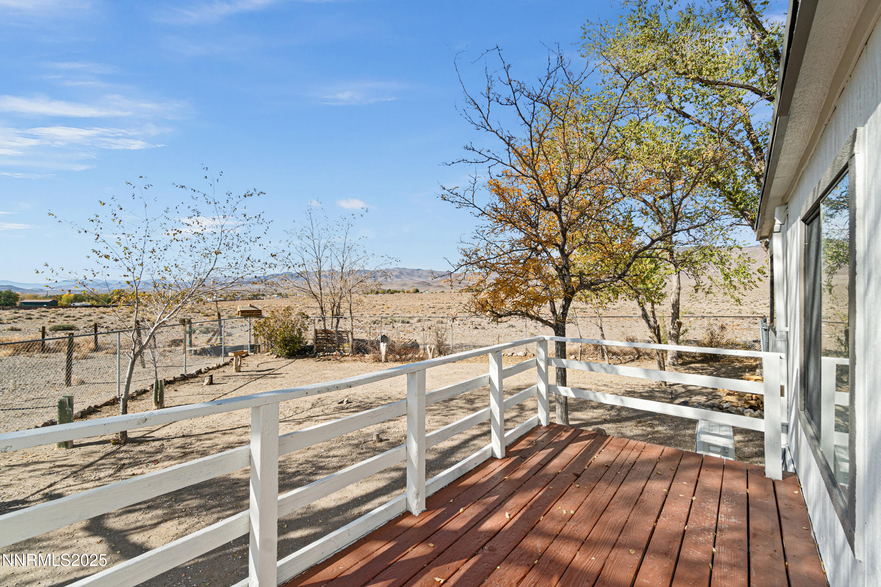 4915 Cheyenne Trail Stagecoach, NV 89429 - Photo 20 of 26 a view of balcony with wooden floor and fence
