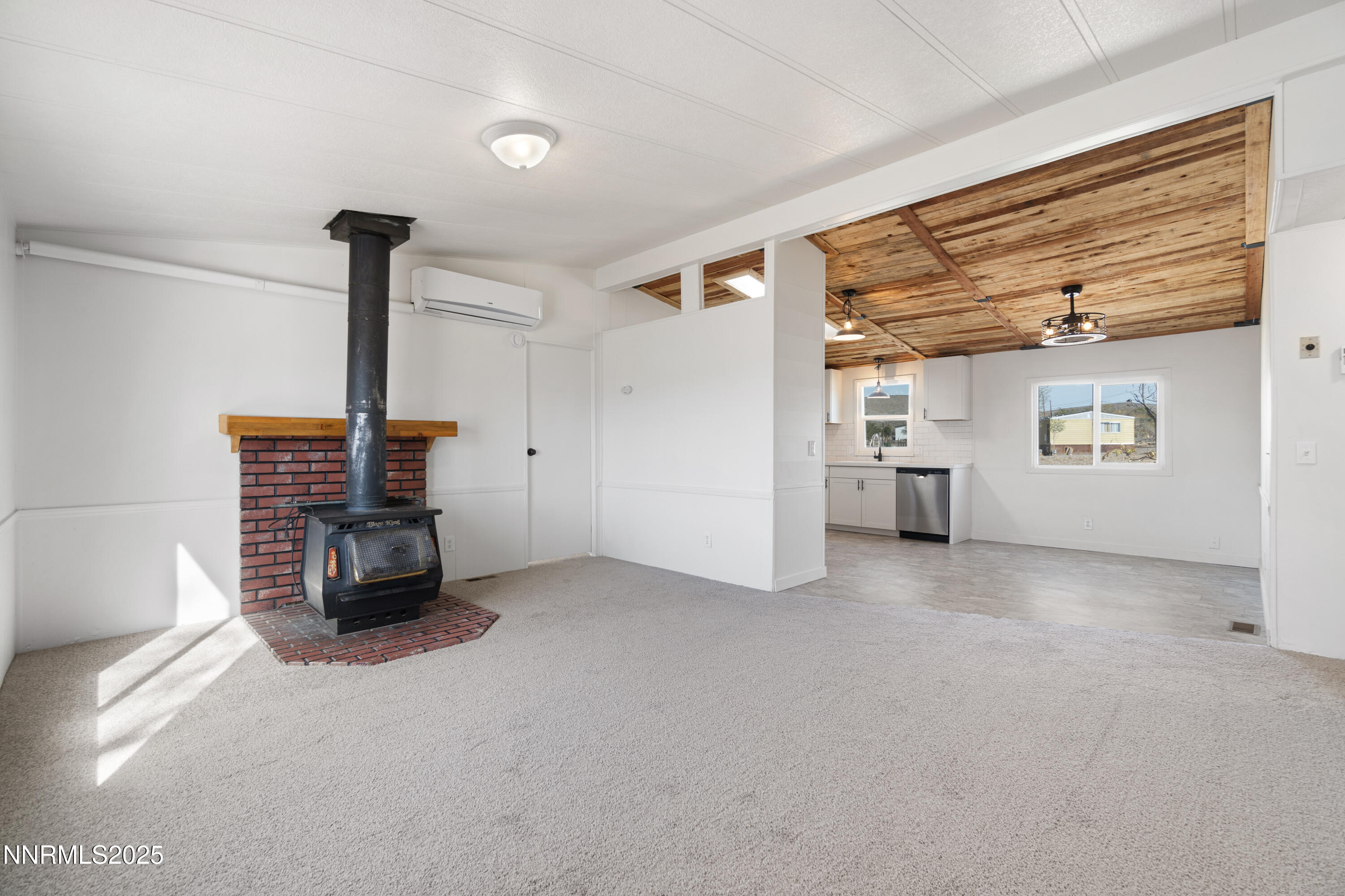 4915 Cheyenne Trail Stagecoach, NV 89429 - Photo 10 of 26 a view of a livingroom with furniture and a fireplace