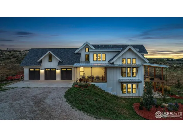 a black and white photo of a house