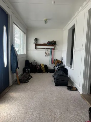 a room with furniture and a window