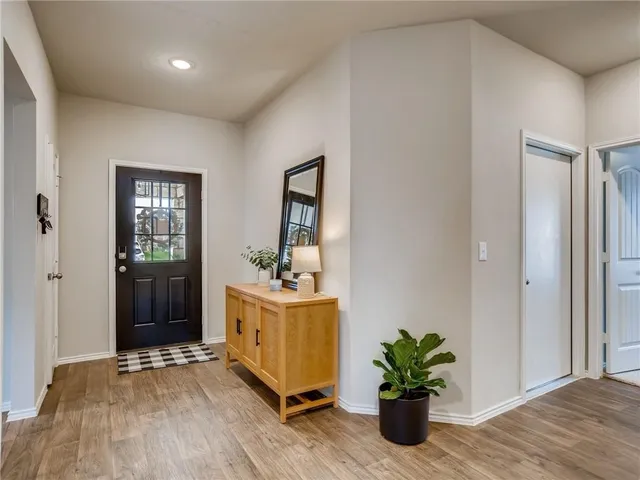 a room with window and wooden floor