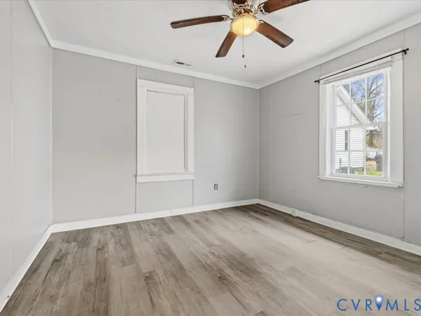 a white bath tub sitting next to a white toilet and sink