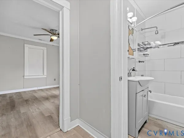 a picture of a bench in front of a building