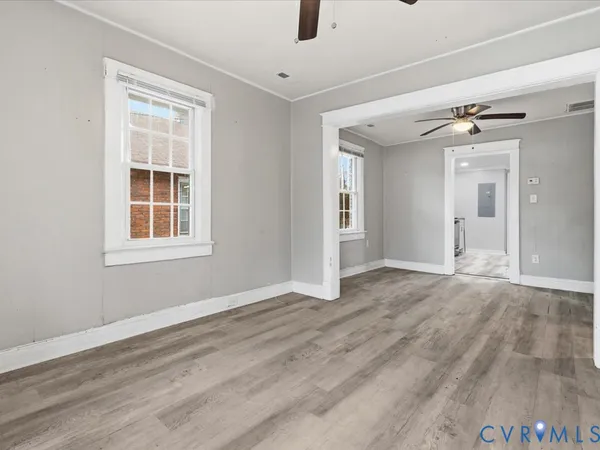 a view of entryway with wooden floor