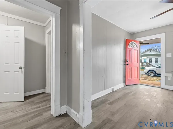 a kitchen with granite countertop a stove and a microwave