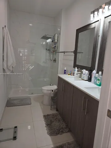 a bathroom with a sink and a vanity