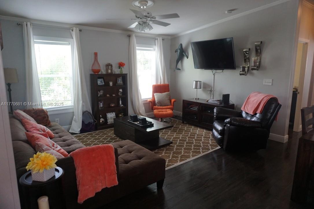 11 Old State Road Key Largo, FL 33037 - Photo 44 of 100 a living room with furniture and a flat screen tv