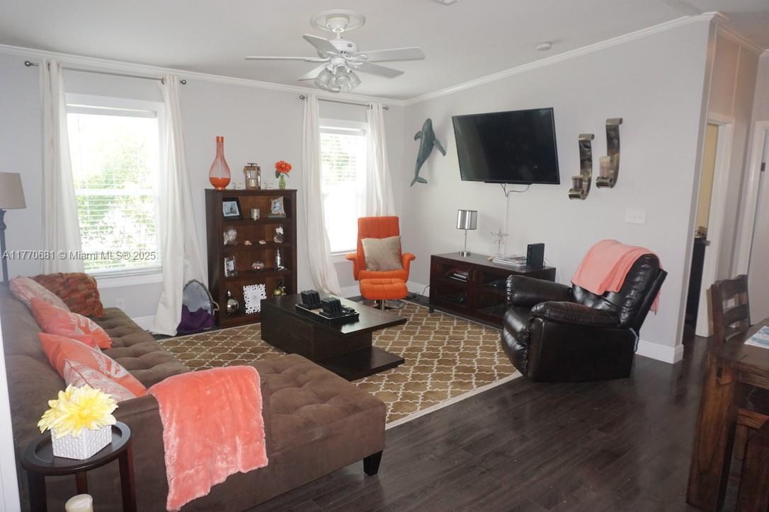 11 Old State Road Key Largo, FL 33037 - Photo 46 of 100 a living room with furniture a flat screen tv and a window