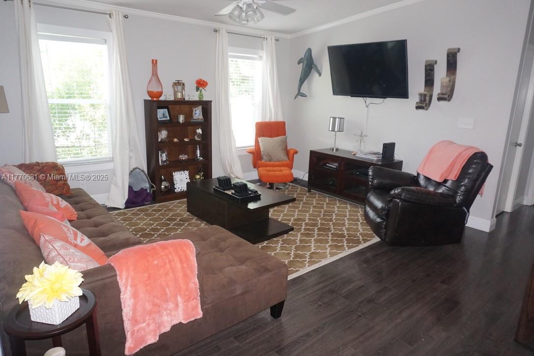 11 Old State Road Key Largo, FL 33037 - Photo 65 of 100 a living room with furniture fireplace and flat screen tv