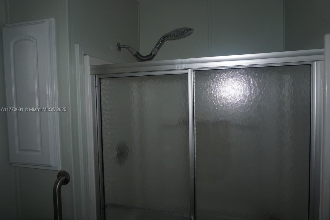 11 Old State Road Key Largo, FL 33037 - Photo 75 of 100 a close view of shower tap