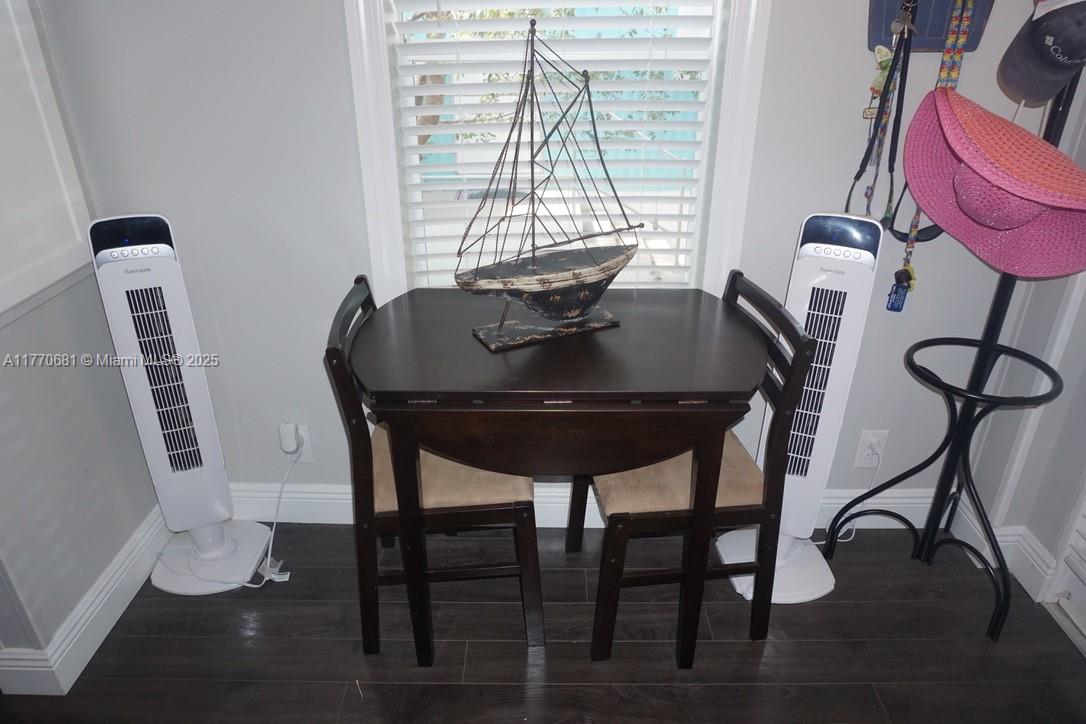 11 Old State Road Key Largo, FL 33037 - Photo 83 of 100 a view of a dining room with furniture and window