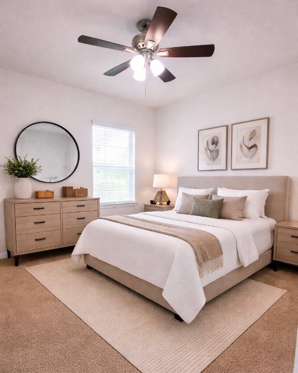 8626 Willet Street Baytown, TX 77521 - Photo 17 of 29 a spacious bedroom with a bed a chandelier and a chandelier