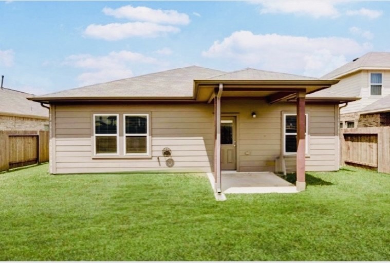 8626 Willet Street Baytown, TX 77521 - Photo 25 of 29 a house view with a garden space