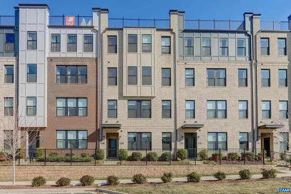 a front view of a building with glass windows
