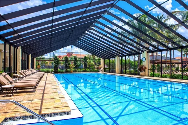 a view of swimming pool with a outdoor seating