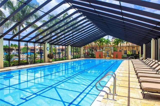 a view of swimming pool with a patio