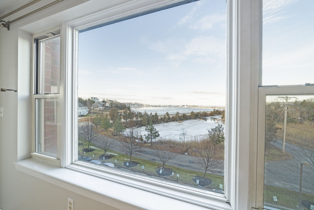 155 George Washington Boulevard, Unit 402 Hull, MA 02045 - Photo 12 of 42 a view of a glass door