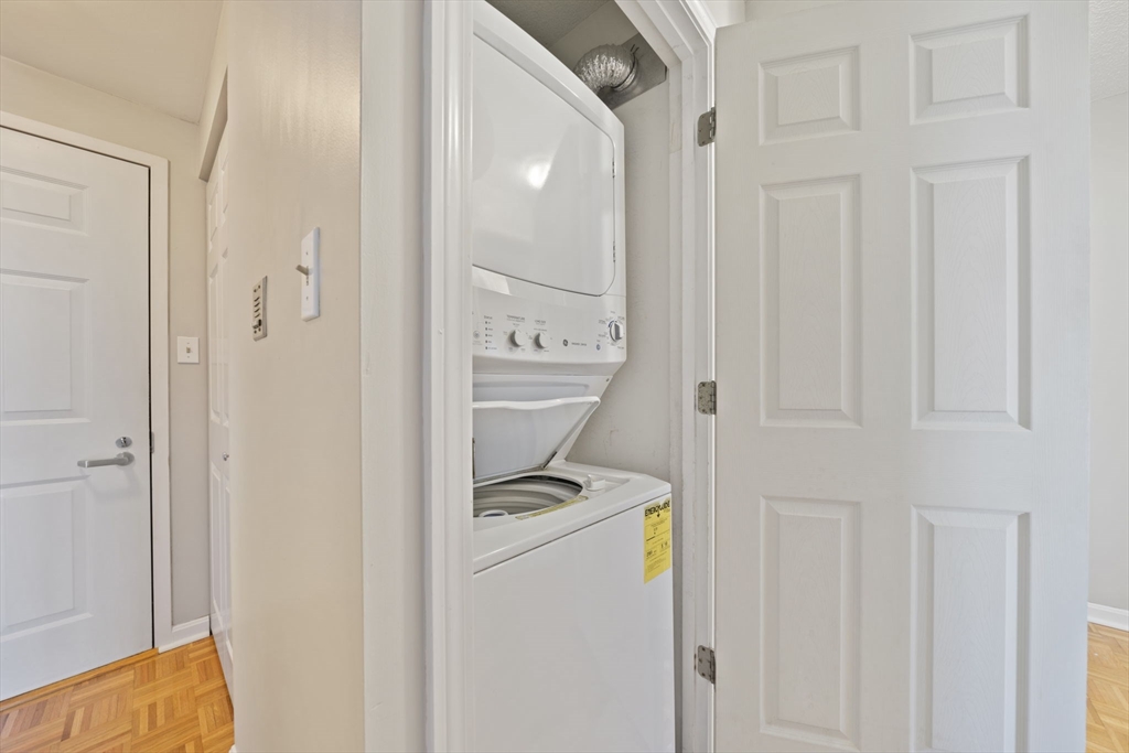 155 George Washington Boulevard, Unit 402 Hull, MA 02045 - Photo 20 of 42 a bathroom with a sink