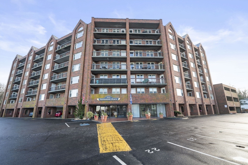 155 George Washington Boulevard, Unit 402 Hull, MA 02045 - Photo 3 of 42 front view of a building with a street