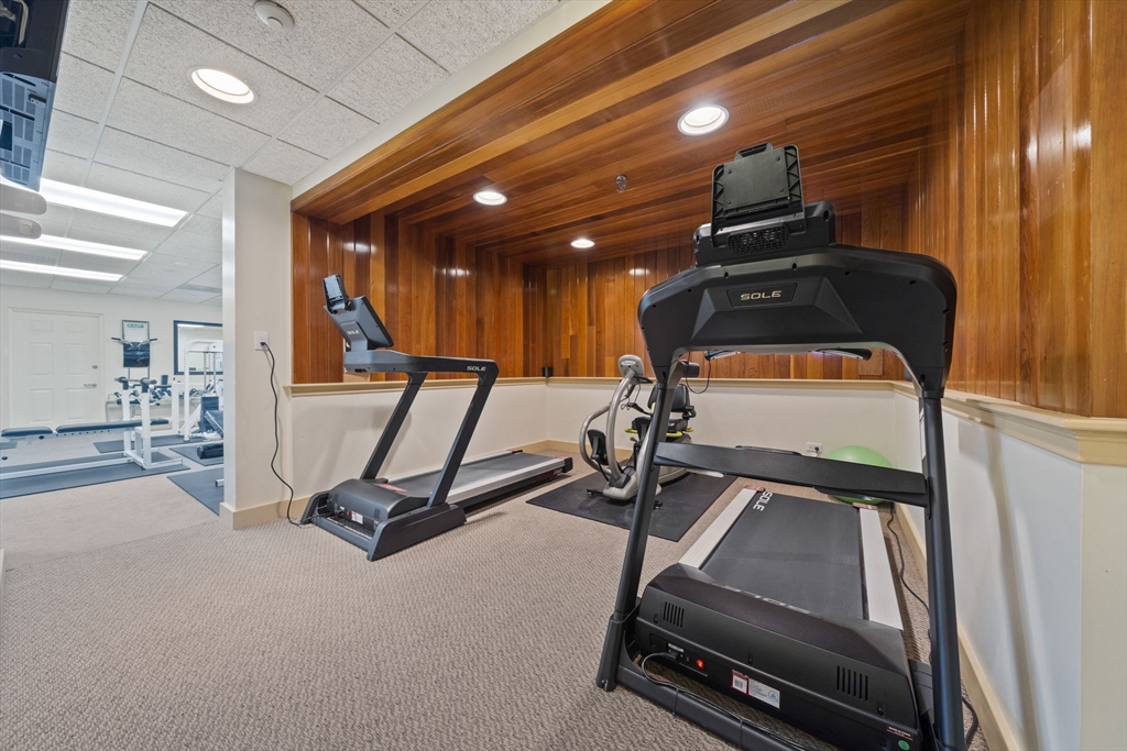 155 George Washington Boulevard, Unit 402 Hull, MA 02045 - Photo 38 of 42 a view of a room with gym equipment