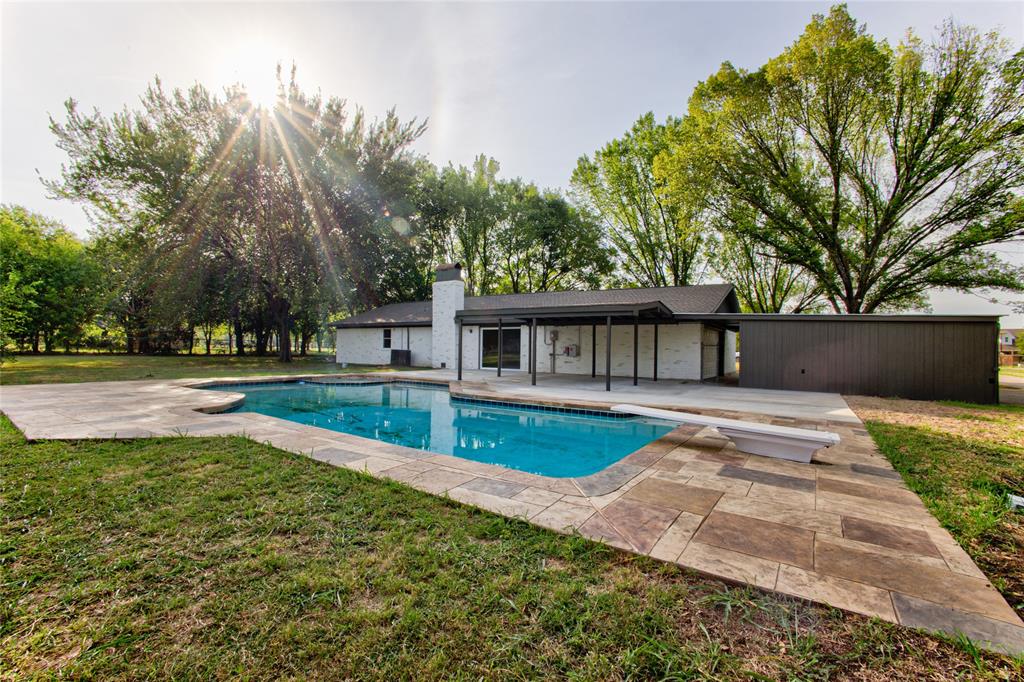 206 Americana Road Palmer, TX 75152 - Photo 31 of 40 Outdoor Pool View with Wide Stamped Apron