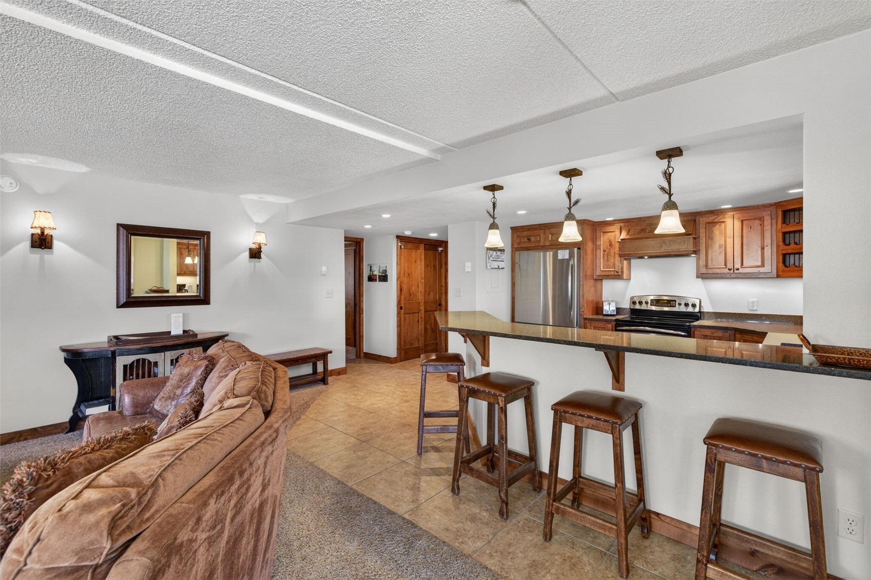 800 Copper Road, Unit 210 Copper Mountain, CO 80443 - Photo 11 of 40 Combined Kitchen Living Dining Room Combo, with updated kitchen and fireplace