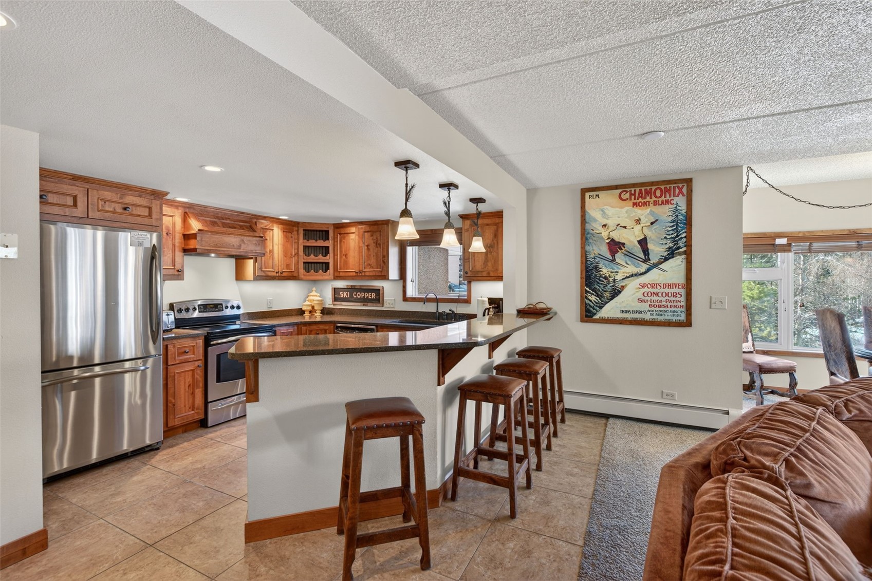 800 Copper Road, Unit 210 Copper Mountain, CO 80443 - Photo 13 of 40 Combined Kitchen Living Dining Room Combo, with updated kitchen and fireplace