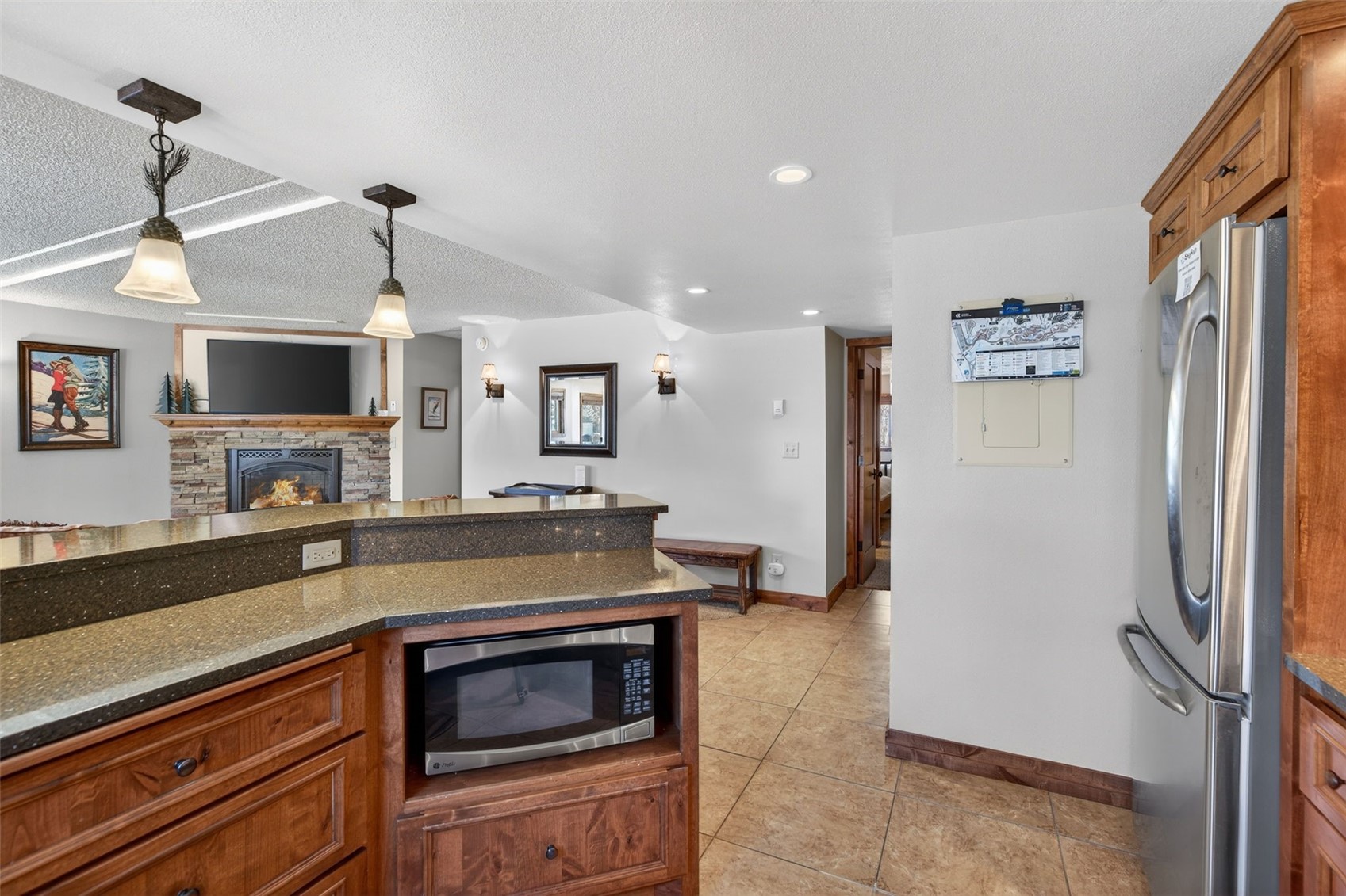 800 Copper Road, Unit 210 Copper Mountain, CO 80443 - Photo 16 of 40 Combined Kitchen Living Dining Room Combo, with updated kitchen and fireplace