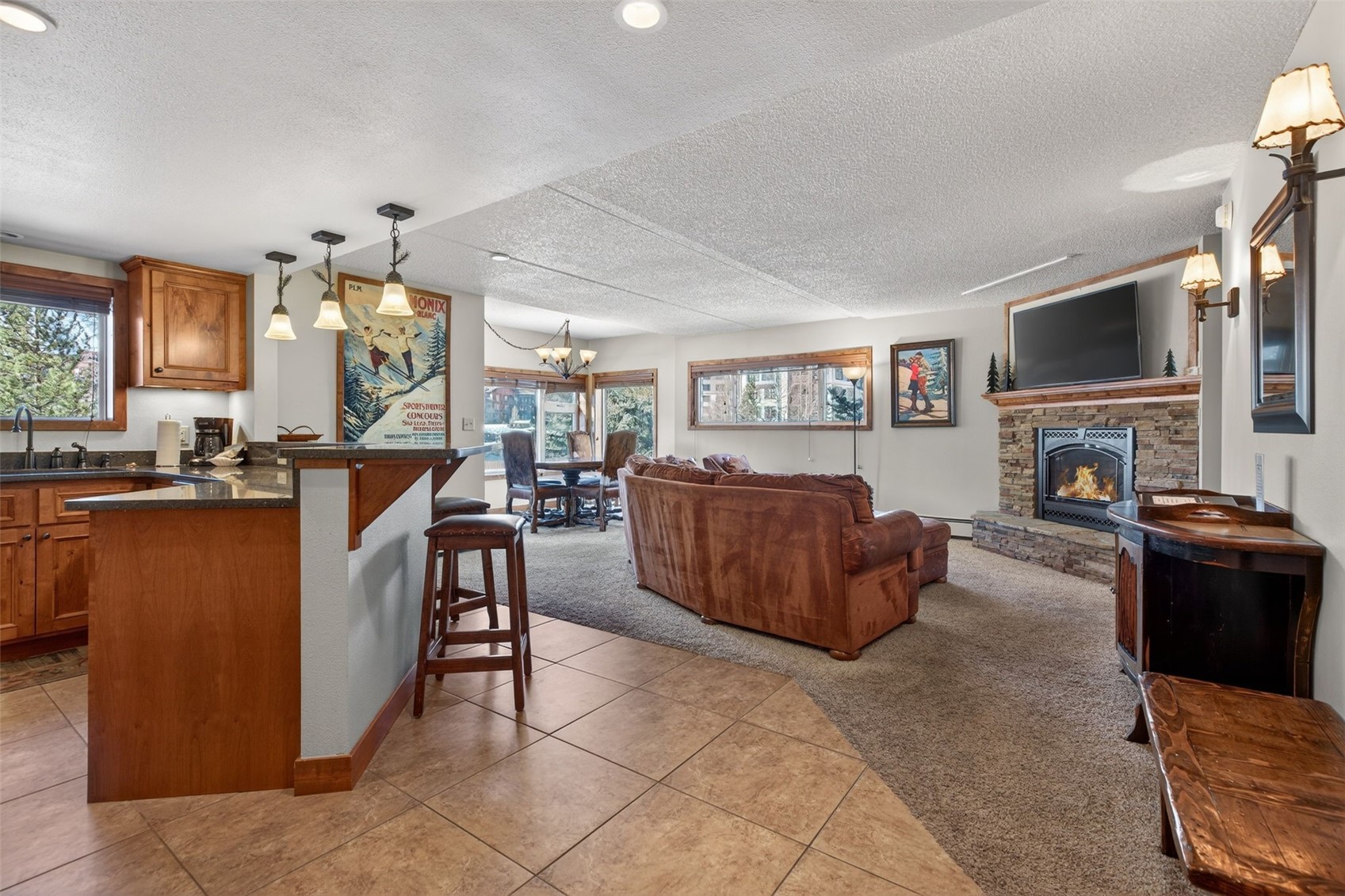 800 Copper Road, Unit 210 Copper Mountain, CO 80443 - Photo 5 of 40 Combined Kitchen Living Dining Room Combo, with updated kitchen and fireplace