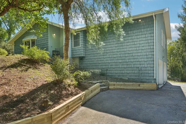 a bathroom with a shower and a sink