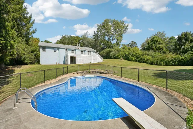 a view of a backyard with hardwood