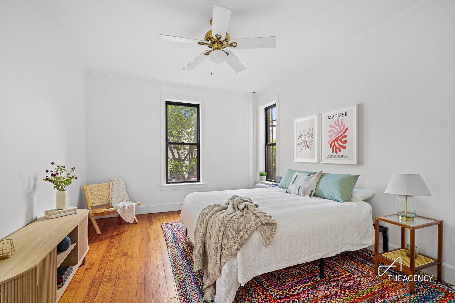 423 15th Street, Unit 2B Brooklyn, NY 11215 - Photo 9 of 10 a bedroom with a bed and wooden floor