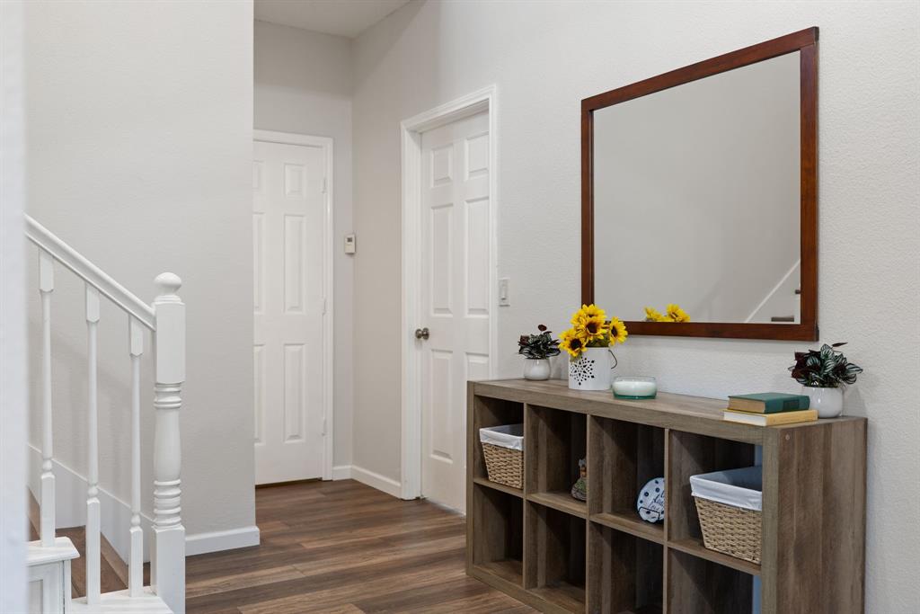 750 Pulitzer Lane Allen, TX 75002 - Photo 6 of 40 a bathroom with a sink and a mirror