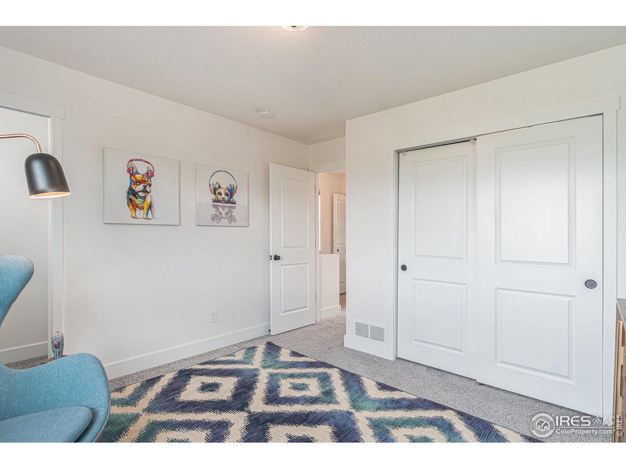 2771 Red Wheat Trail Berthoud, CO 80513 - Photo 15 of 24 a view of livingroom with hardwood floor and hallway