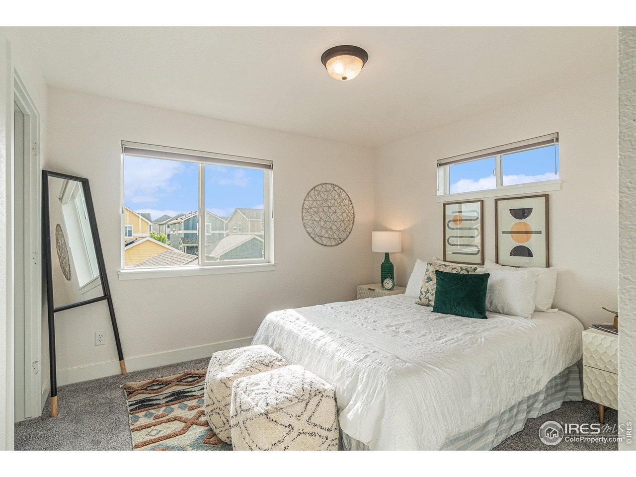 2771 Red Wheat Trail Berthoud, CO 80513 - Photo 19 of 24 a bedroom with a bed and a window
