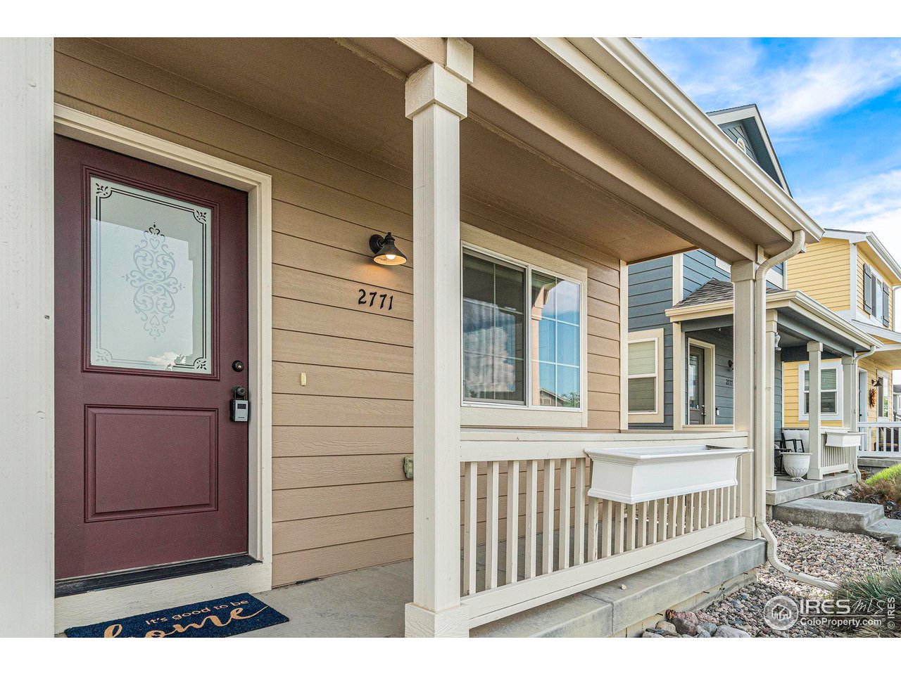 2771 Red Wheat Trail Berthoud, CO 80513 - Photo 3 of 24 a view of front door and a window