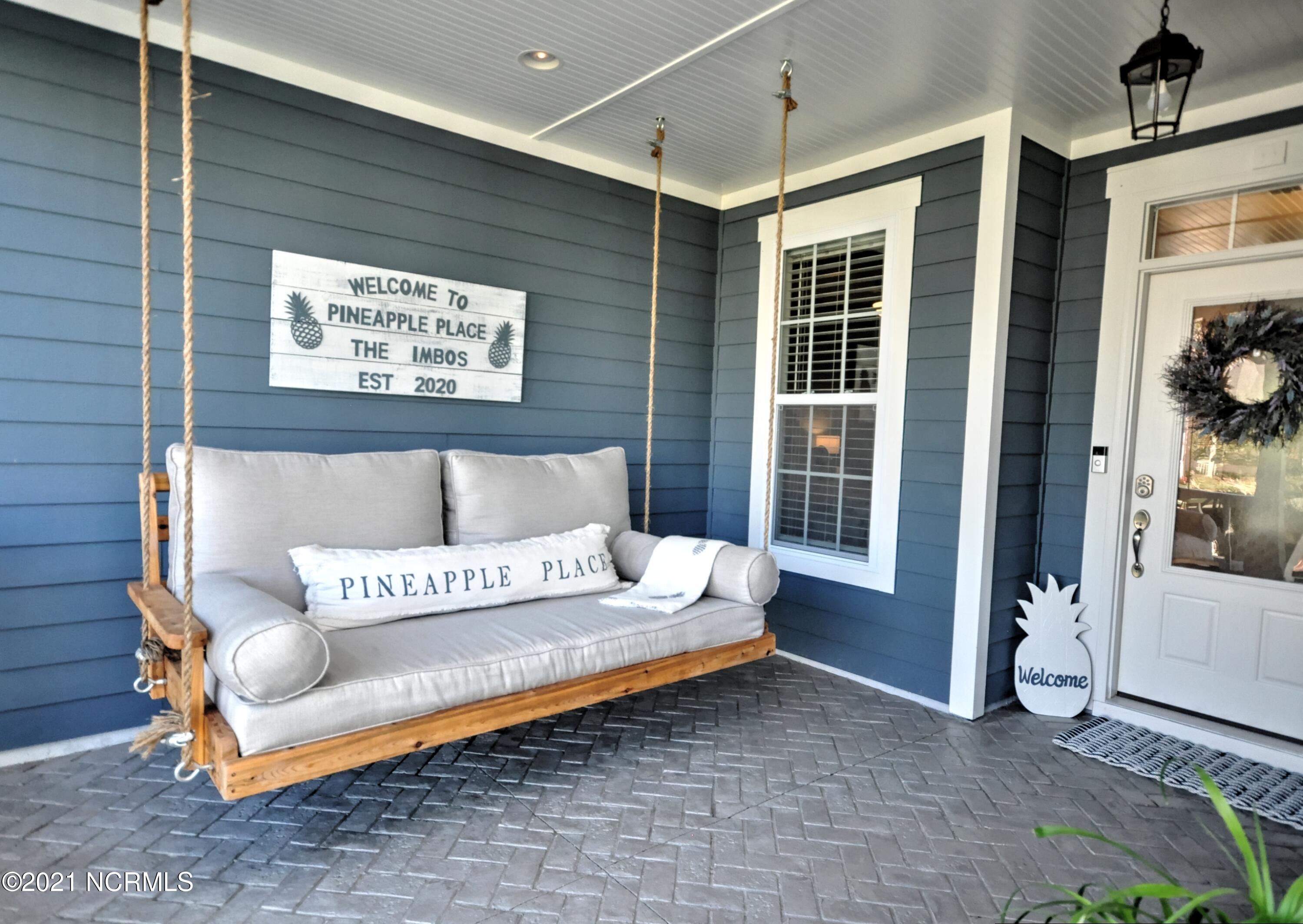 1444 Long Pond Road Southwest Ocean Isle Beach, NC 28469 - Photo 3 of 48 Porch Swing