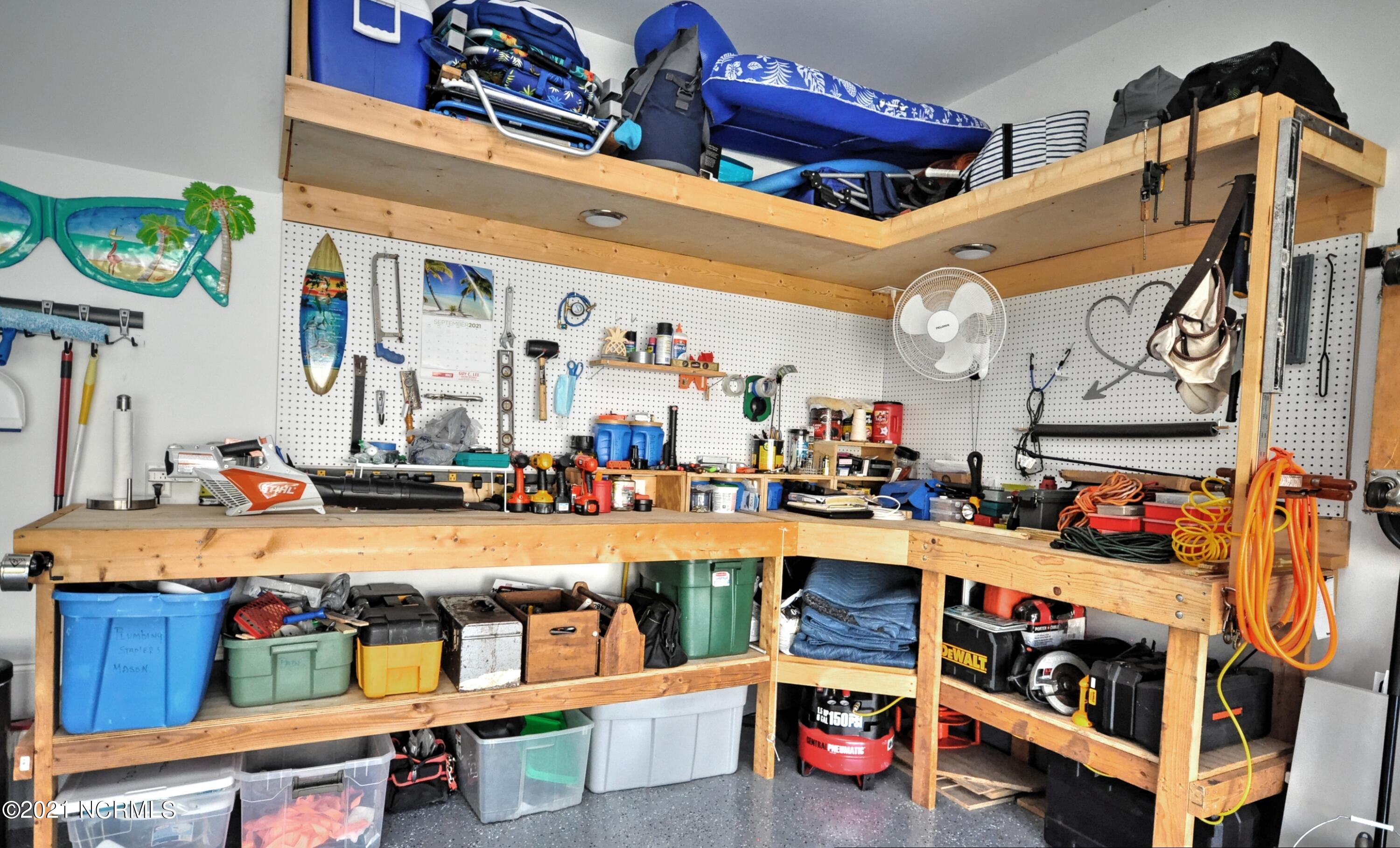 1444 Long Pond Road Southwest Ocean Isle Beach, NC 28469 - Photo 36 of 48 Garage Workbench