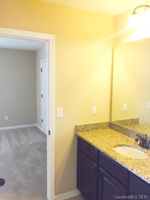 1834 Larkspur Way, Unit 203 Tega Cay, SC 29708 - Photo 4 of 24 a view of an empty room and window