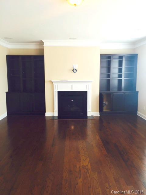 1834 Larkspur Way, Unit 203 Tega Cay, SC 29708 - Photo 6 of 24 a view of room with window and wooden floor