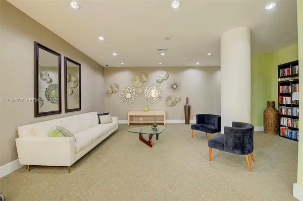 a living room with furniture and a couch