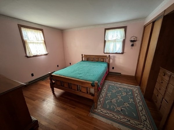 115 Forest Street Danvers, MA 01923 - Photo 11 of 19 a room with furniture and a window