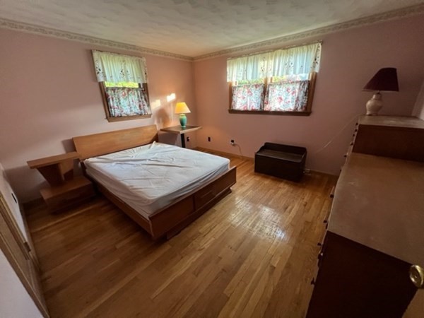 115 Forest Street Danvers, MA 01923 - Photo 13 of 19 a living room with furniture and a window
