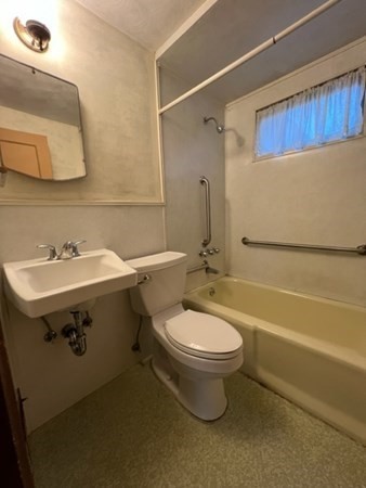 115 Forest Street Danvers, MA 01923 - Photo 15 of 19 a bathroom with a sink toilet and shower