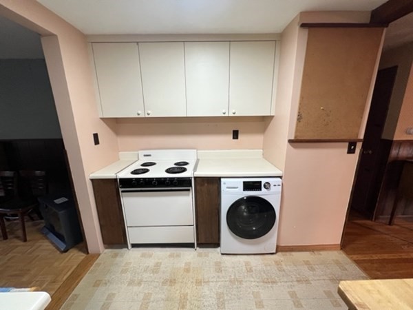 115 Forest Street Danvers, MA 01923 - Photo 9 of 19 a utility room with dryer and washer