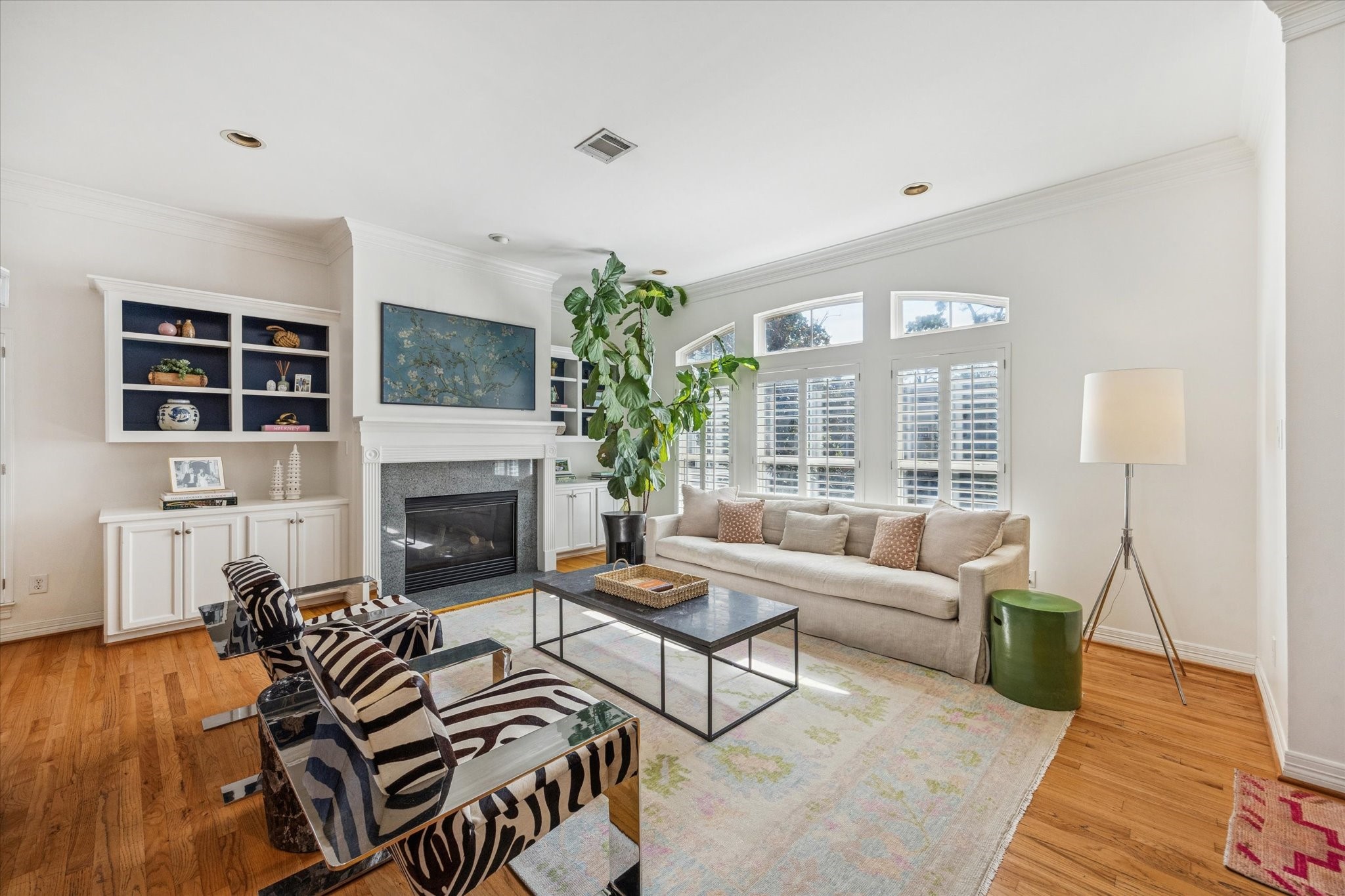 2700 Wroxton Road West University Place, TX 77005 - Photo 12 of 32 a living room with furniture and a fireplace